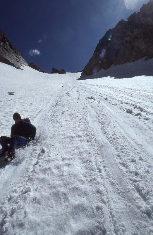 1988-038 Colchuck Pk N Buttress Jul 1988 014 Glissading to Colchuck Lake.jpg